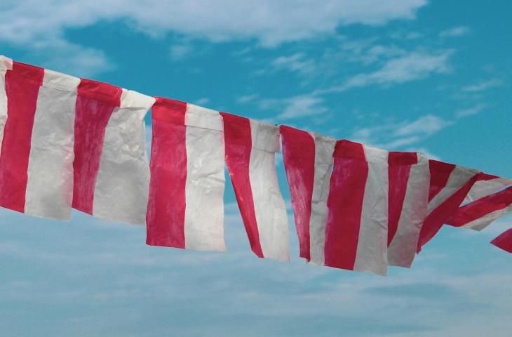 Ilustrasi bendera Indonesia. [Unsplash/Tusik Only]
