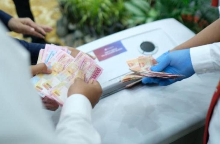 Ilustrasi Uang Palsu- cara cek uang palsu lewat aplikasi di HP. [Istimewa]